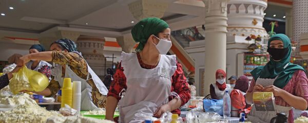 Продавец на рынке Мехргон Продавец на рынке Мехргон - Sputnik Таджикистан